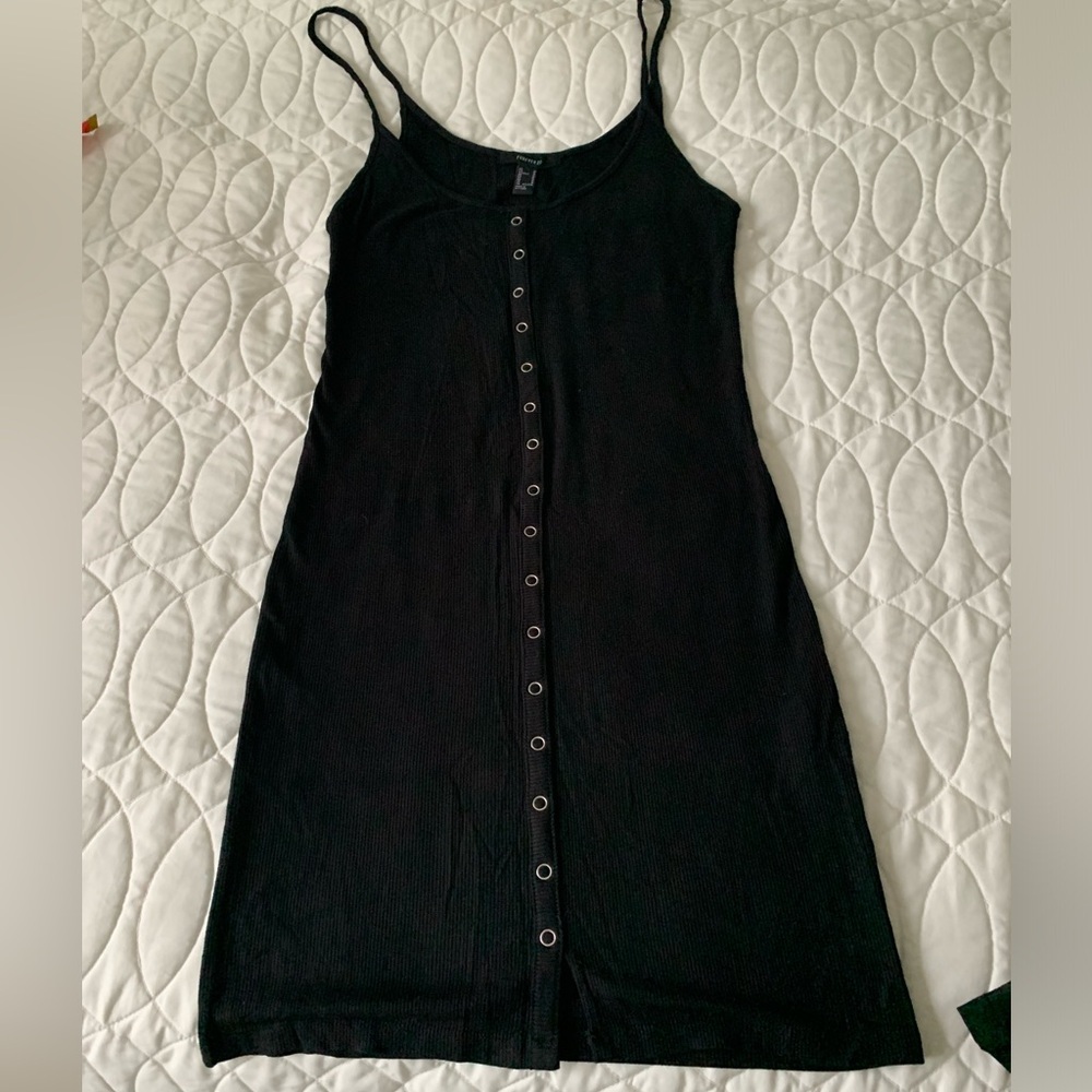 #25 Black ribbed dress with spaghetti straps and stud detail down the front.  Si